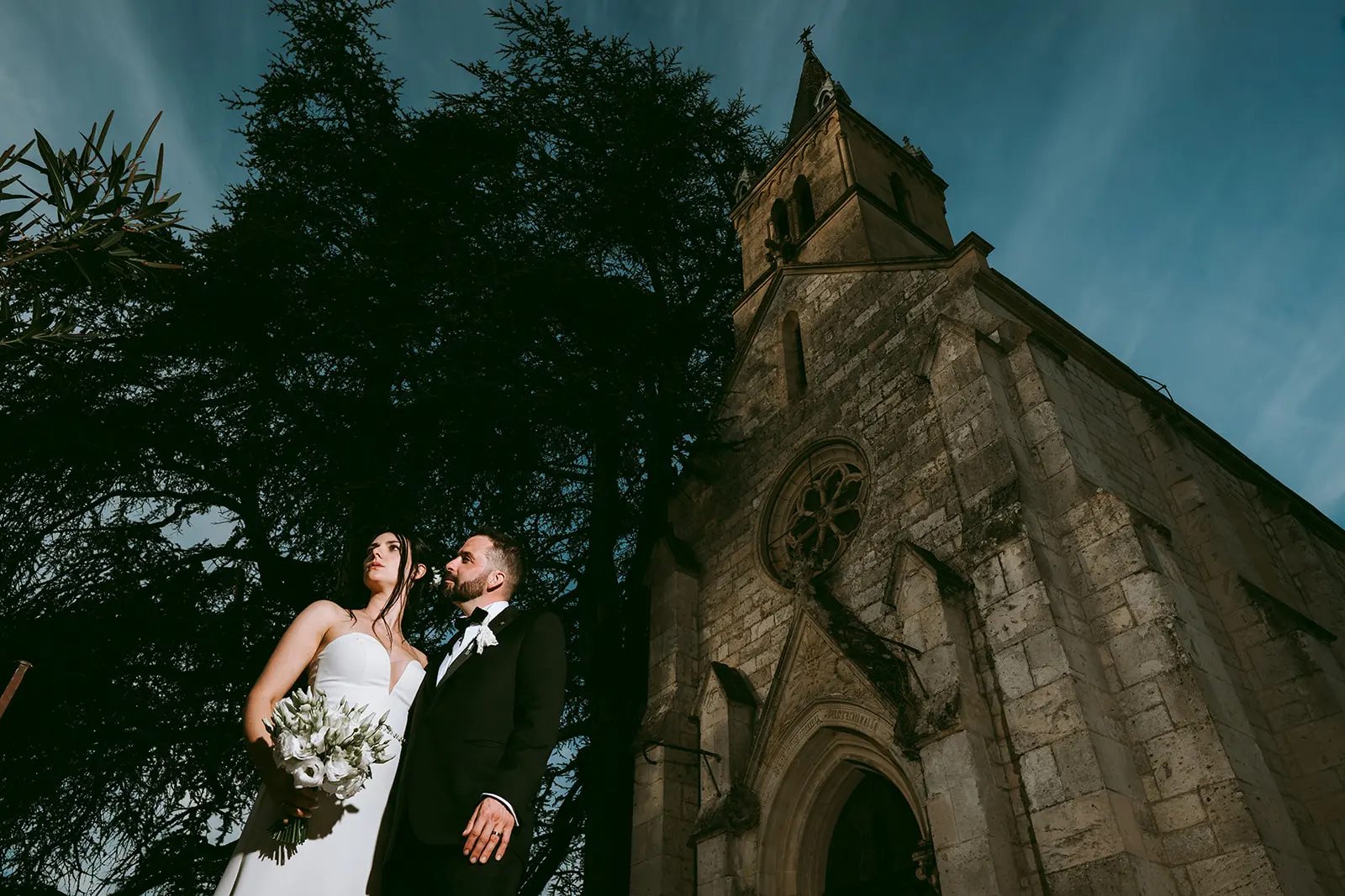 The newlyweds in front of the church
